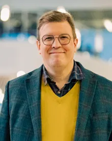 Jón Guðnason, photographed in the atrium at Reykjavik University.